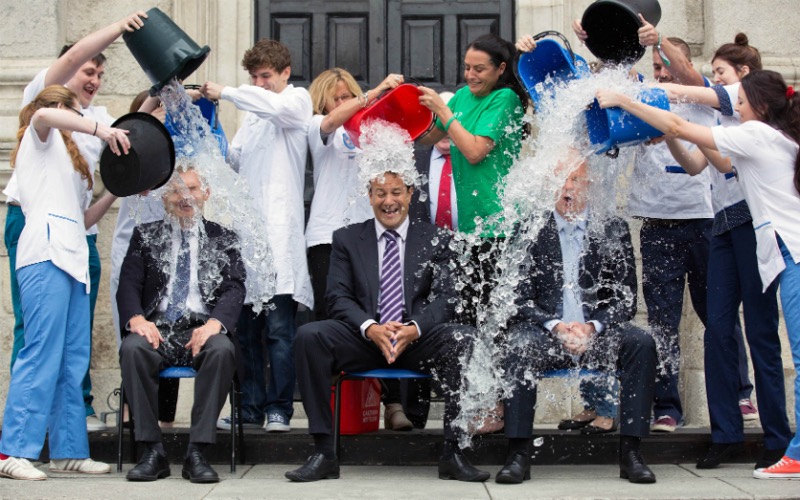 Making a splash for Motor Neurone Disease: Professor Paul Browne, Head of the School of Medicine, Minister for Health Dr Leo Varadkar TD and Dr Graham Love, Chief Executive of Health Research Board, gathered in Trinity to take on the Ice Bucket Challenge in September 2014.