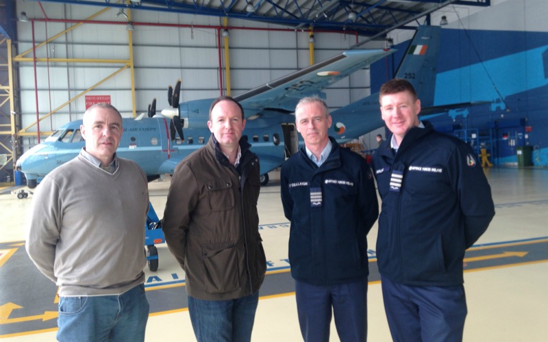 Members of Trinity's School of Physics, Mr Joe McCauley and Professor Peter Gallagher with Irish Air Corps pilots Lt Col O'Ceallagh and Lt Col Verling (the solar eclipse-chasing team). They stand in front of the Casa Maritime Patrol Aircraft, which will follow the path of the total solar eclipse while on its regular patrol.