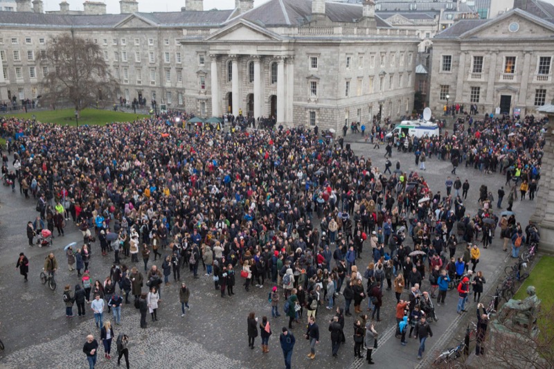 A packed crowd gathered to watch the partial solar eclipse from Front Square.