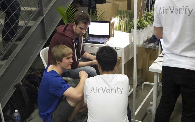 The 'AirVerify' team demonstrate their prototype at the Innovation Showcase.