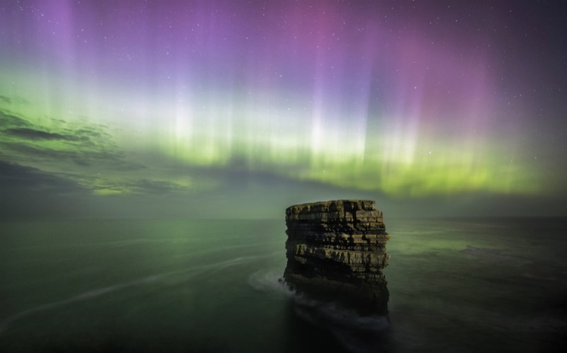 The March 17 geomagnetic storm as seen from Co. Mayo, with the Sea Stack, known as 'Dún Briste', (The Broken Fort) in shot. Image Credit (Brian Wilson).