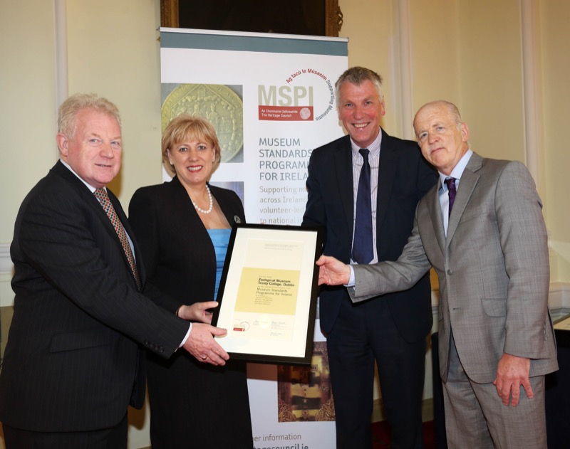 Museum Curator, Dr Martyn Linnie, receives the award.