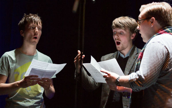 Students from the School of Drama, Film and Music performing at the lecture: Dermot Maher, Killian Farrell, and Philip Hodgins.