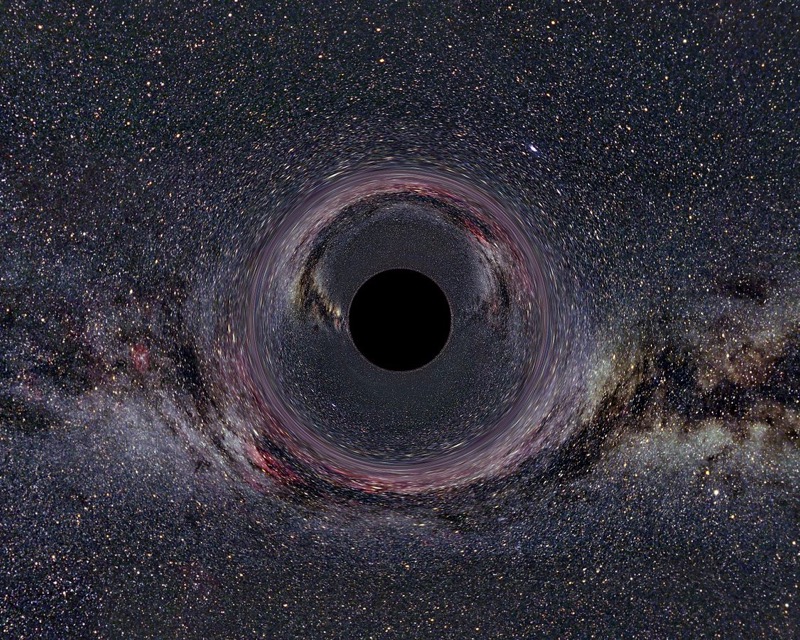 "Black Hole Milkyway" by Ute Kraus, Physics education group Kraus, Universität Hildesheim, Space Time Travel, (background image of the milky way: Axel Mellinger) - Gallery of Space Time Travel. 