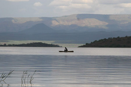 Fisherman at lake baringo, a large freshwater lake in the great rift.